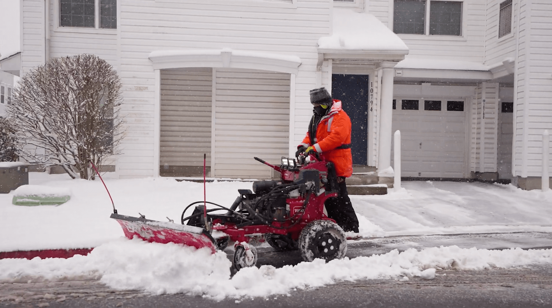 Crew Member on Riding Snow Plow