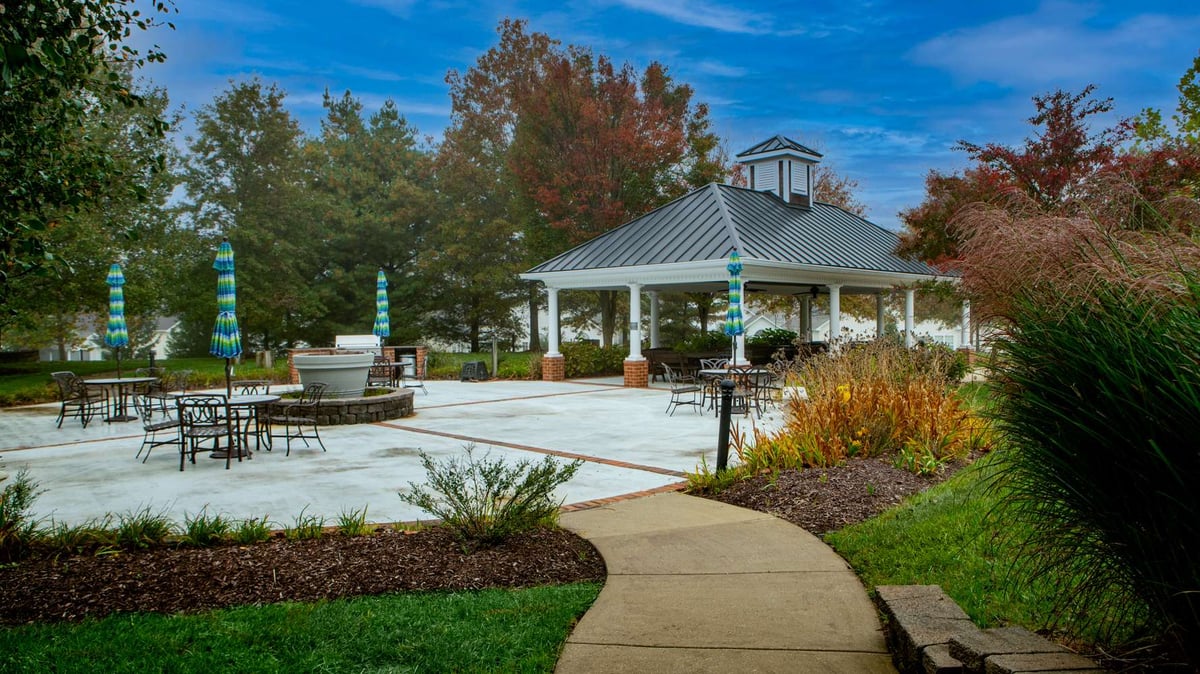 hoa clubhouse community space with well maintained plantings