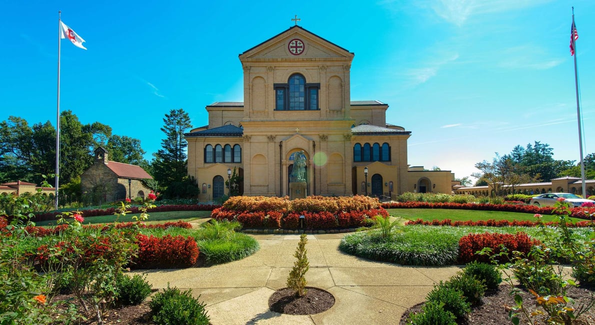 FranciscanMonastery church flowers sidewalk mulch grass plantings