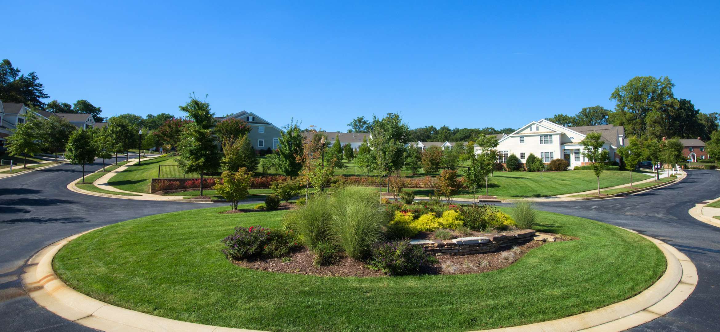 HiddenBluff hoa circular drive condo plantings island ornamental grass