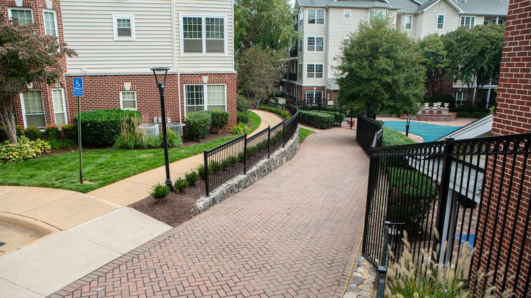 LevelGreen Commercial Landscping maintenance paver pathway walkway sidewalk fence pool HOA condo lawn shrubs