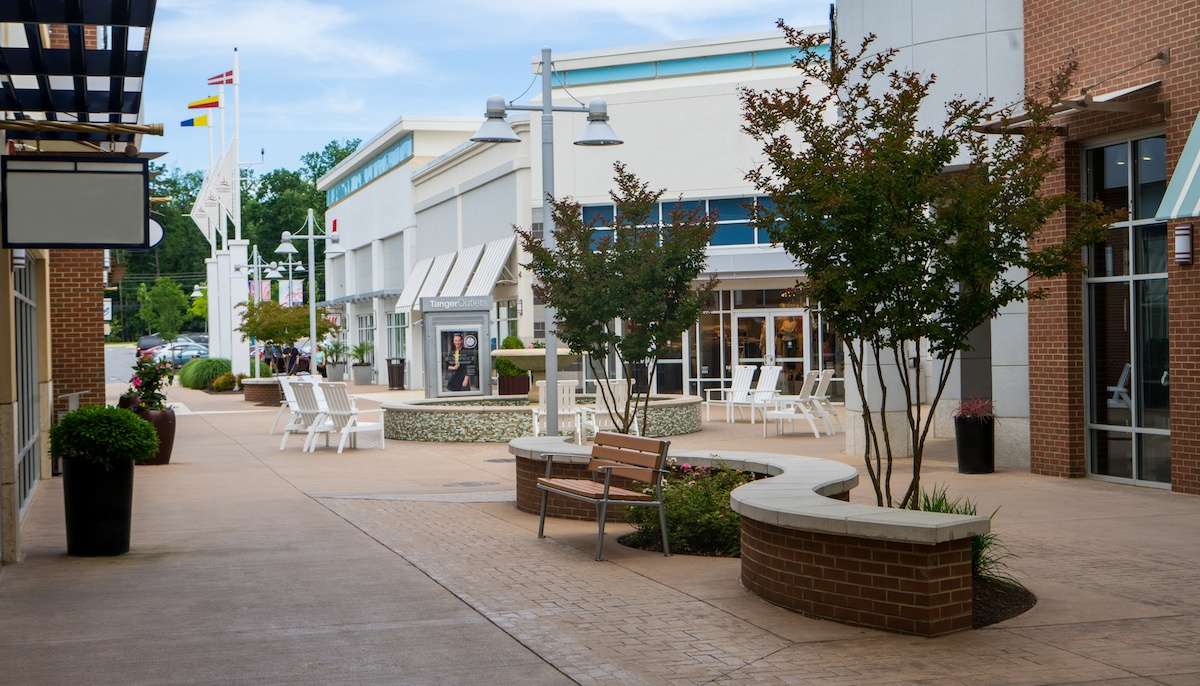 Tanger Outlets trees plantings container gardens seating outdoor shopping