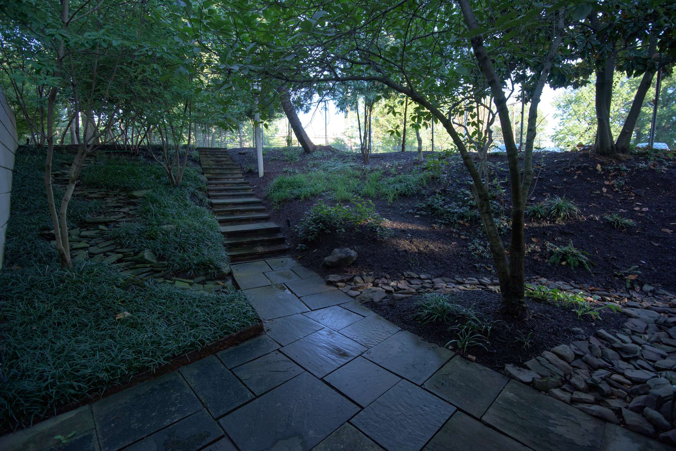 USCCB natural stone walkway steps patio plantings church