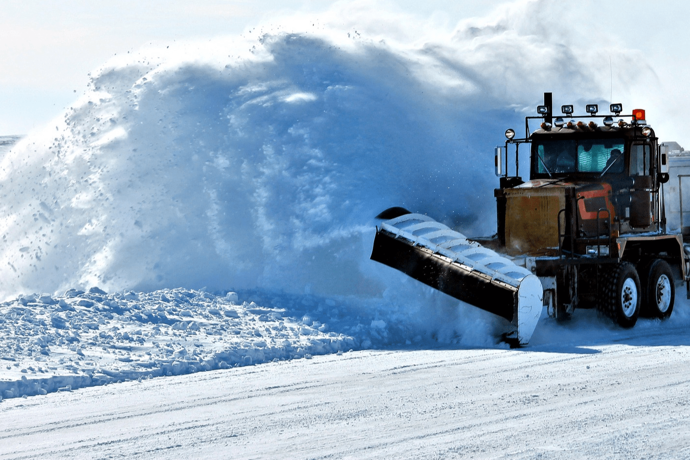 close up large truck snow plow snow removal