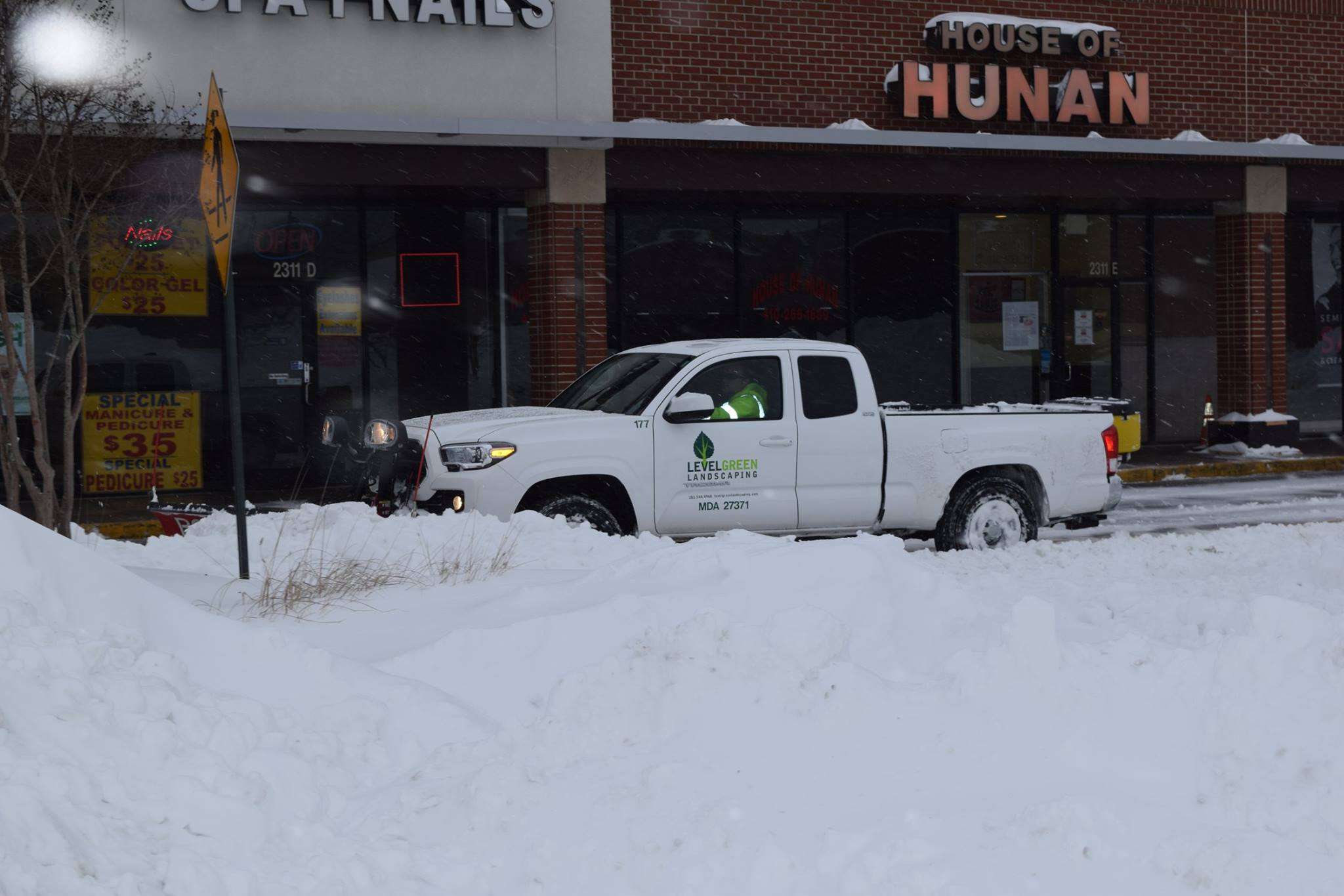 snow plowing at plaza