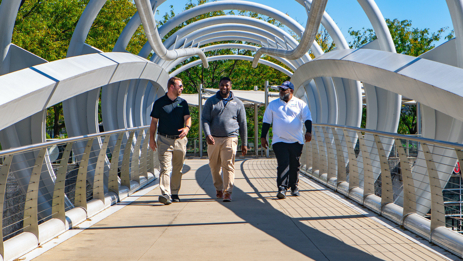 Capitol Riverfront Improvment District property manager and account manager walking across bridge-1