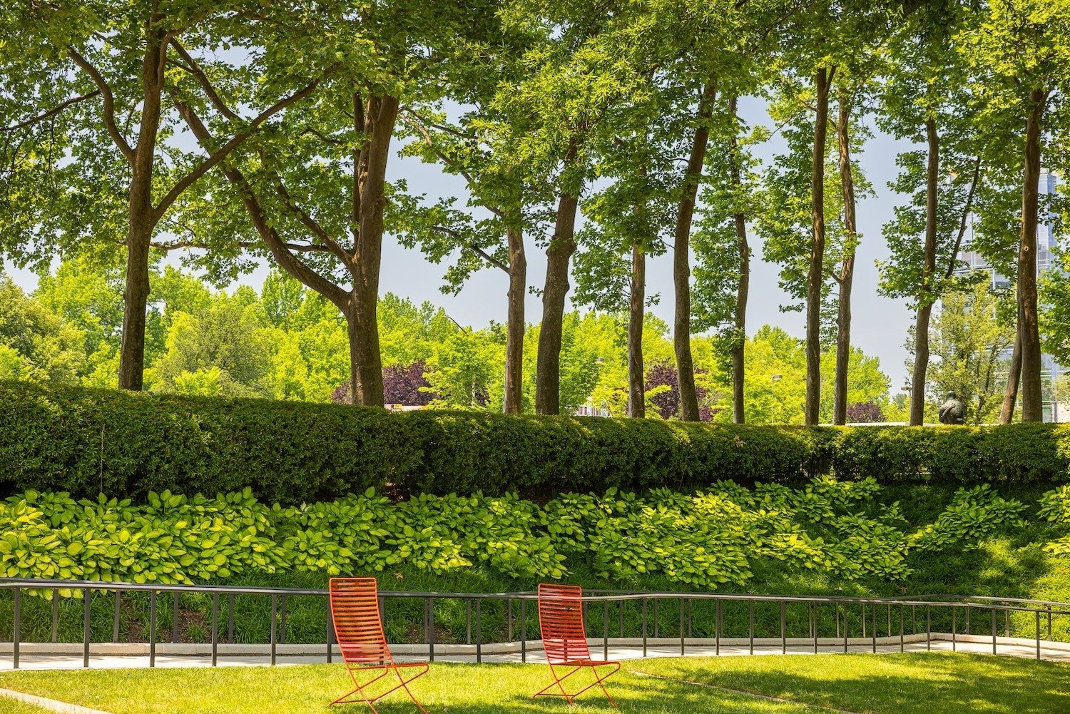 Columbia Lakefront sloped landscape beds outdoor seating 