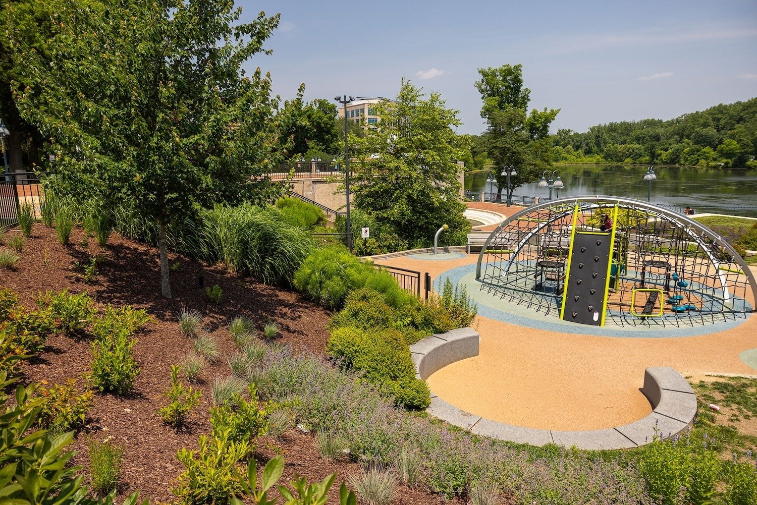 Columbia Lakefront walking paths landscape beds playground equipment sloped water 