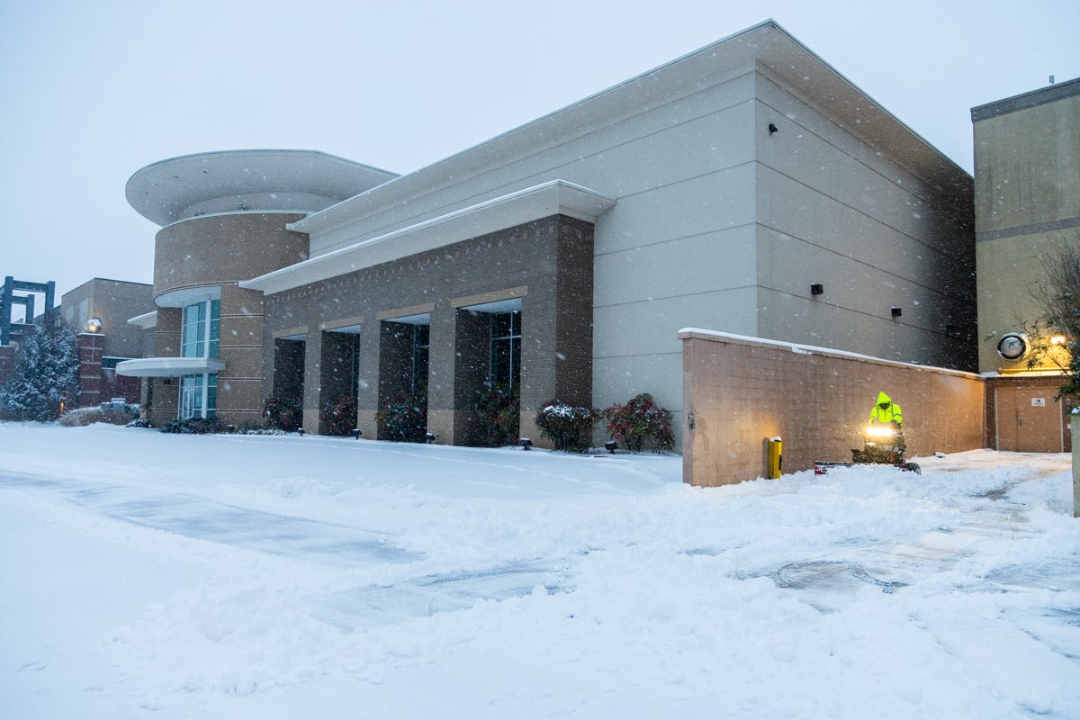 Commercial snow removal crew plowing snow 1