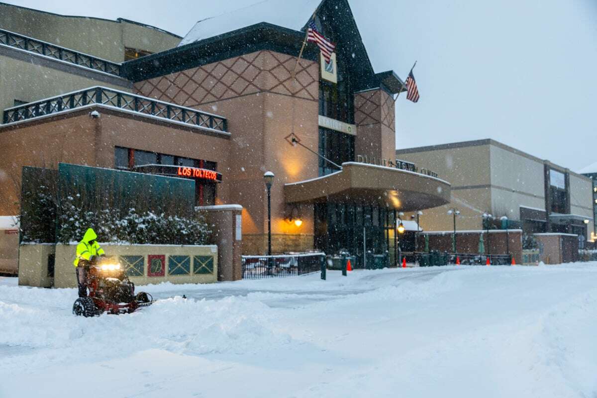 Commercial snow removal crew plowing snow 3