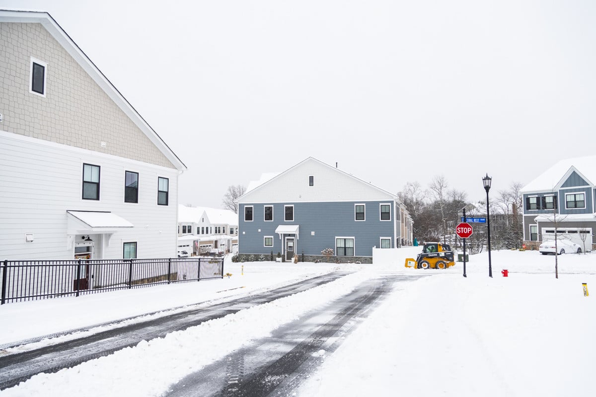 Commercial snow removal crew plowing snow 37