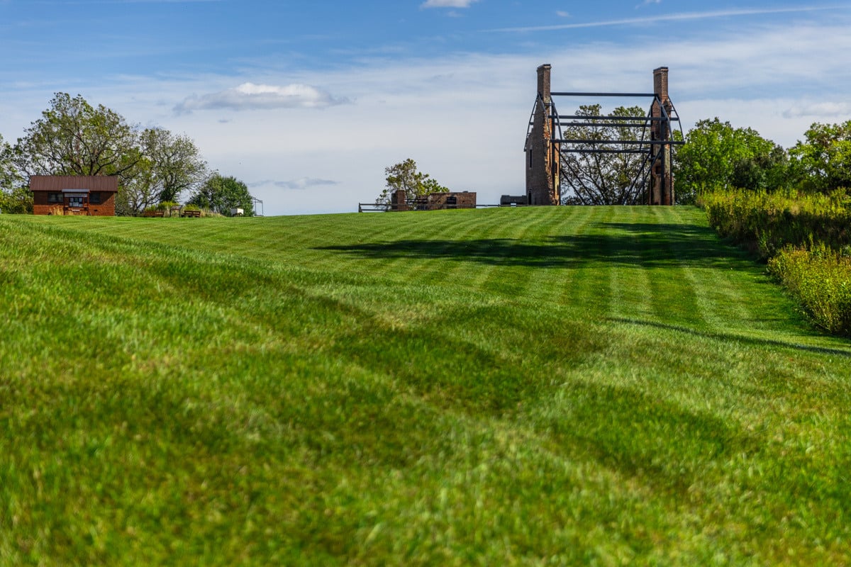 Environmental Research Center ruins of old building large green grass