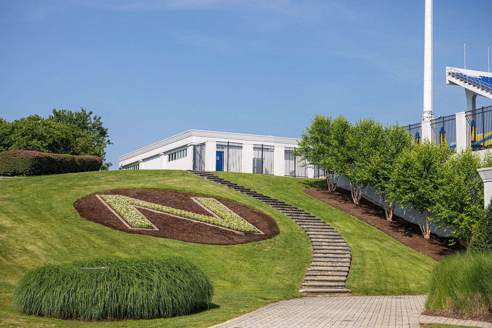 Navy Memorial Stadium landscape bed paver steps lawn letter plants