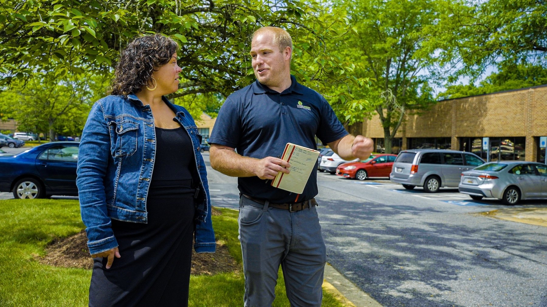 Patuxent Woods account manager and property manager looking at grounds for snow removal 