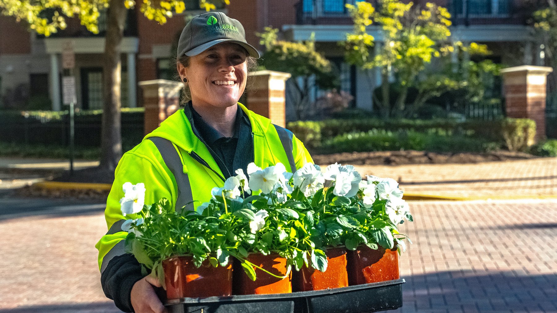 Sam Earleywine branch manager carrying flowers crew