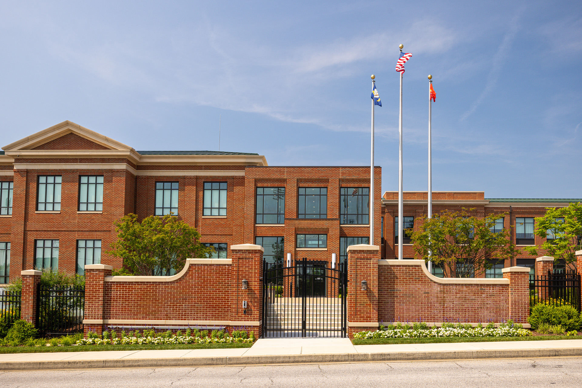 Flugel Alumni Center iron brick fence landscape beds entrance 4