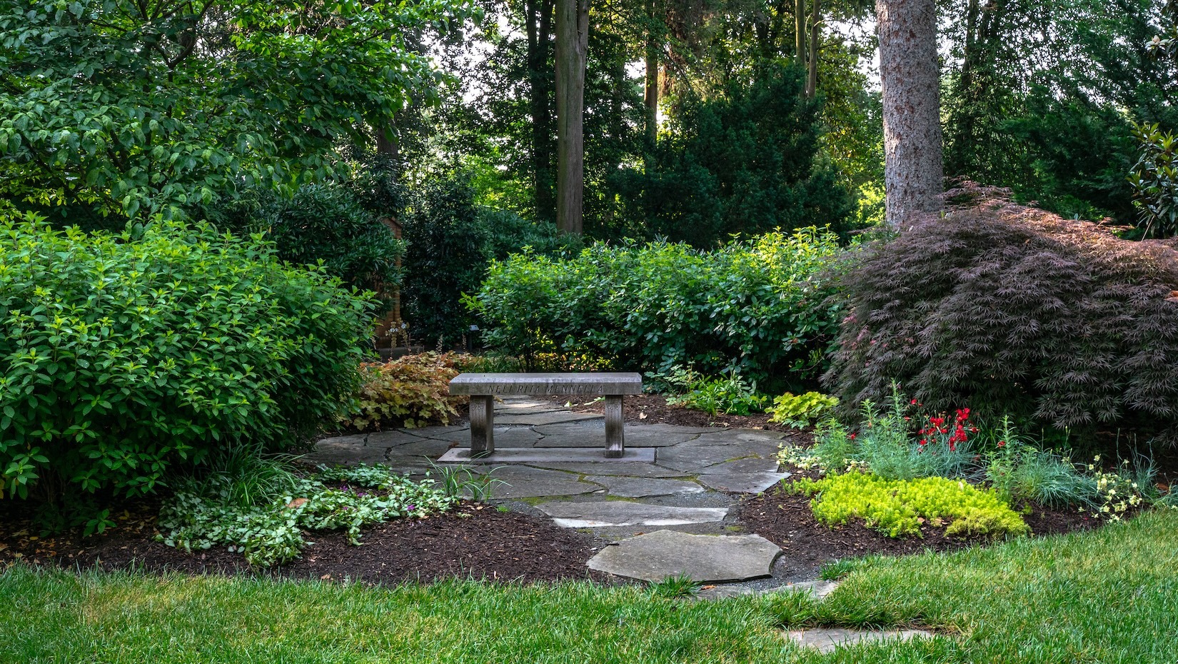 Franciscan Monastery walking path bench landscape beds 
