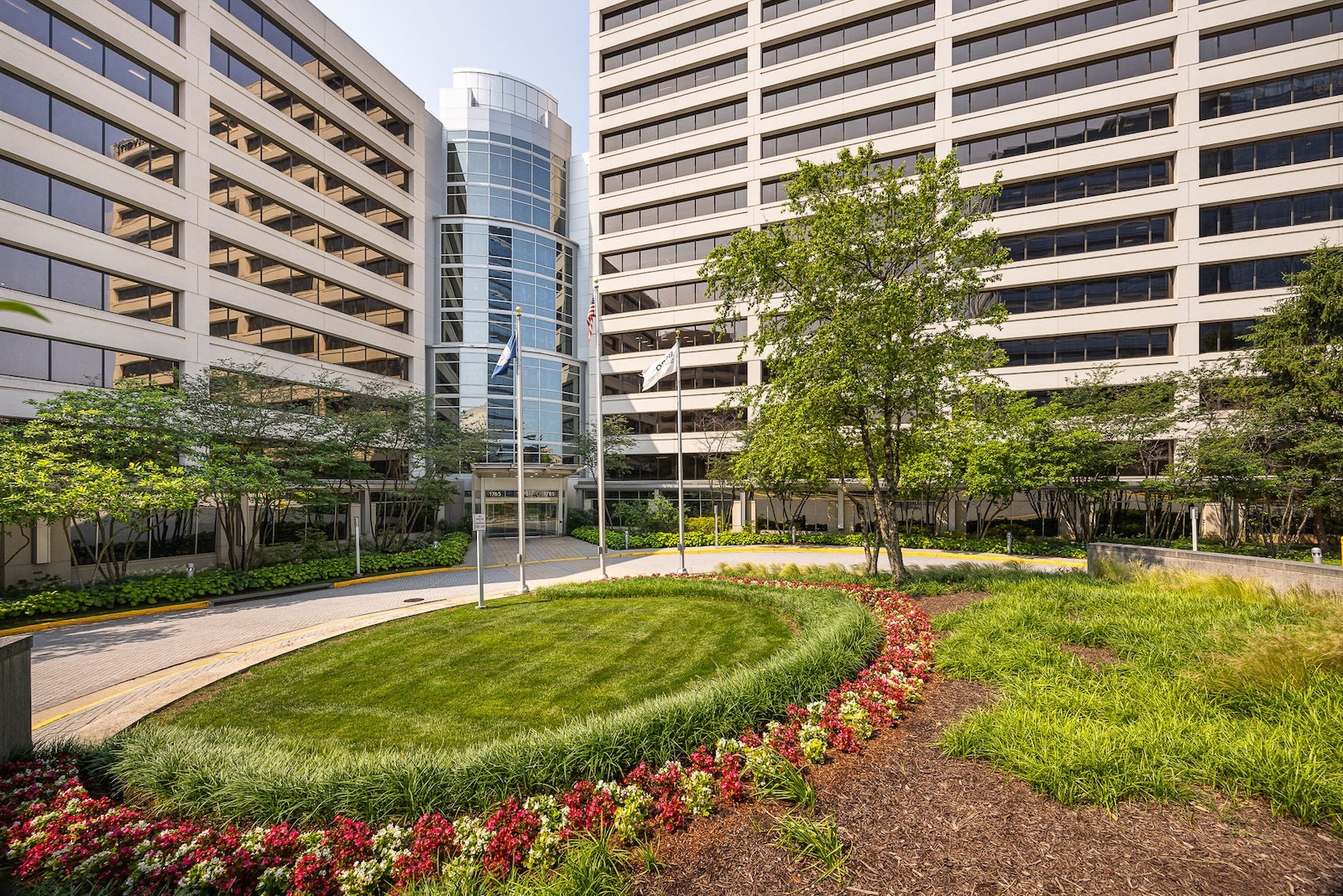 The boro landscape beds green lawn front of building 4