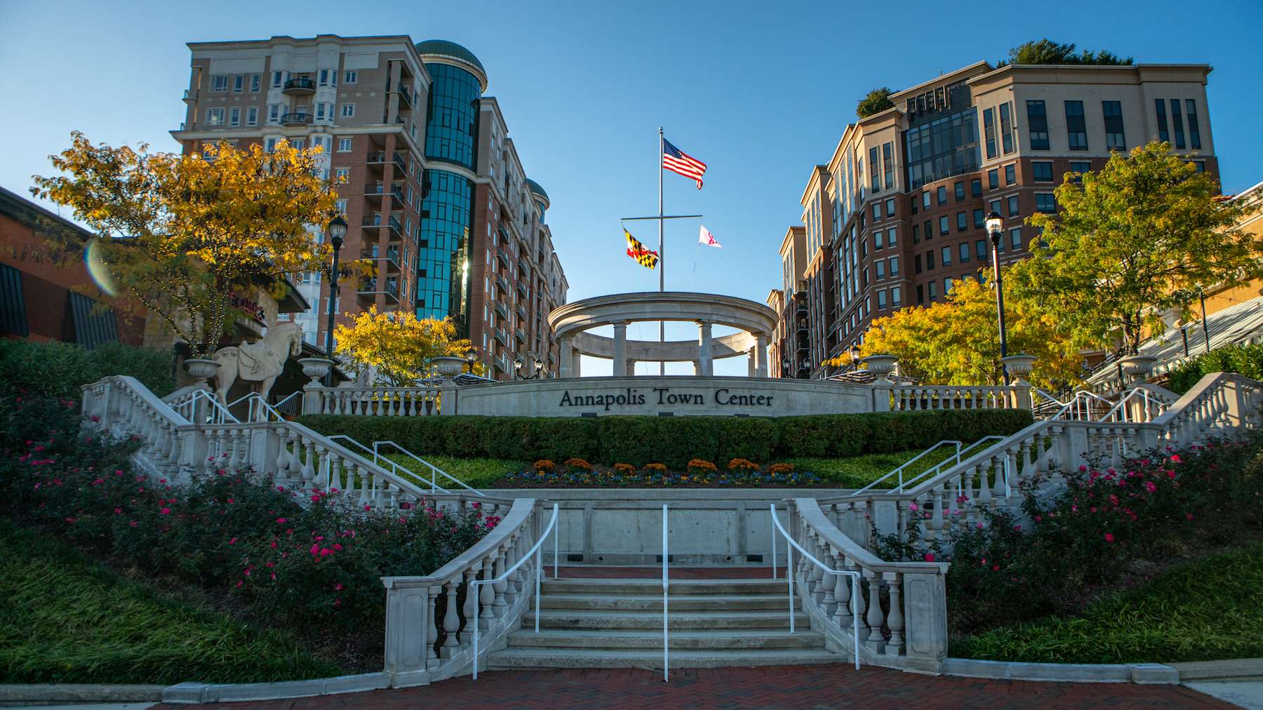 Annapolis Town Center stairs with plantings and signage