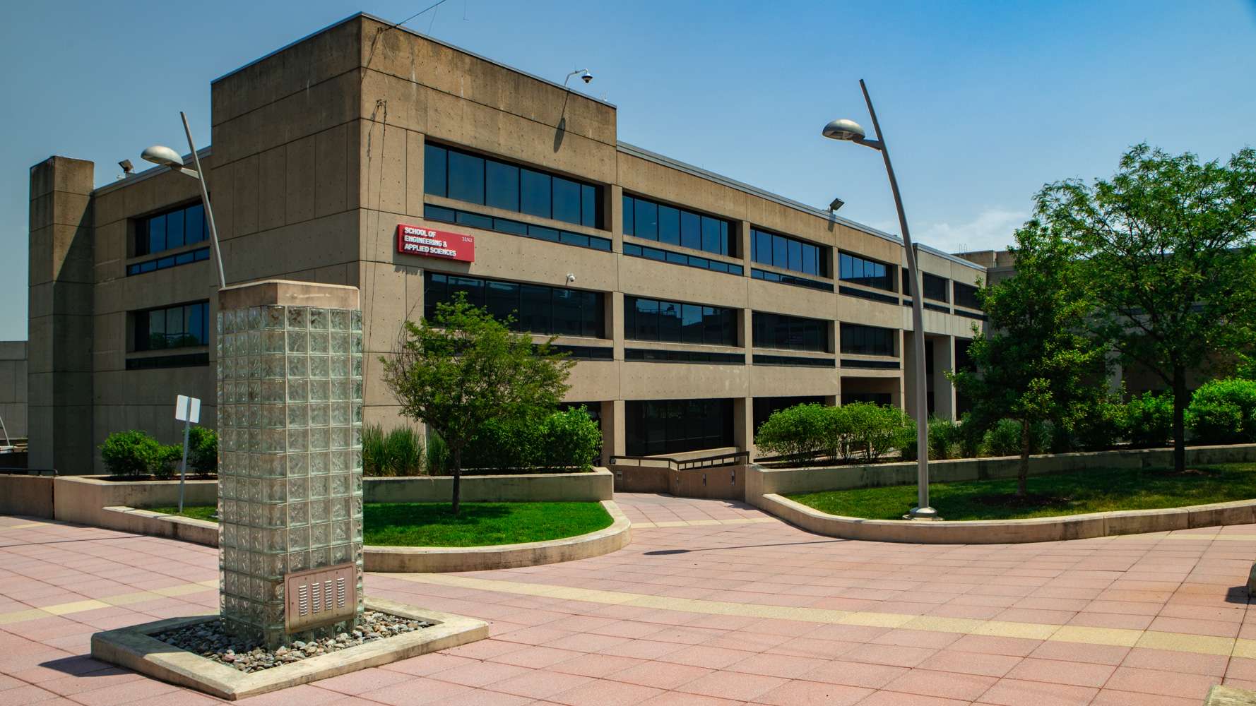 Commercial landscaping Howard University Hospital pavers, lawn, trees, shrubs