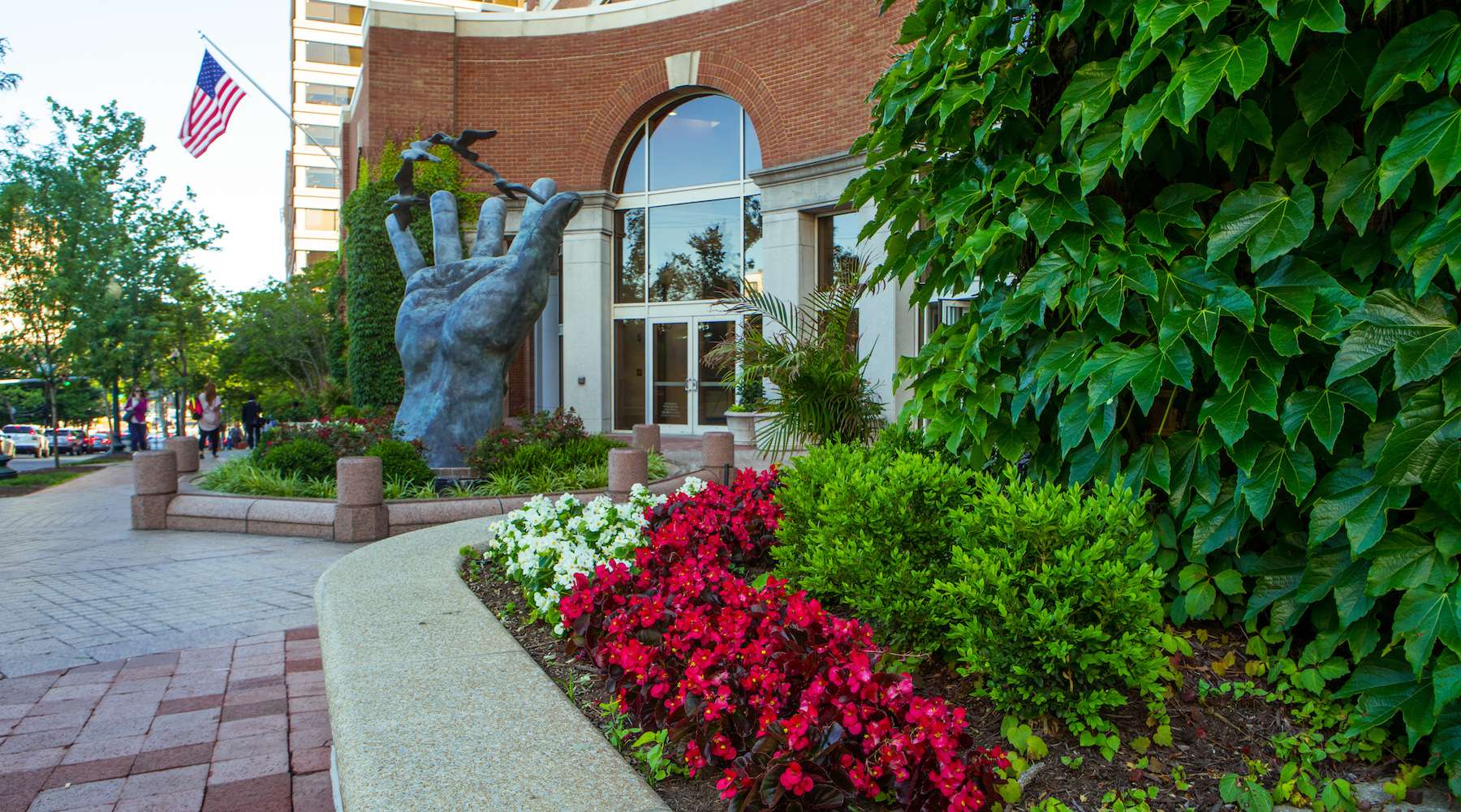 municipality sculpture flowers plantings entrance