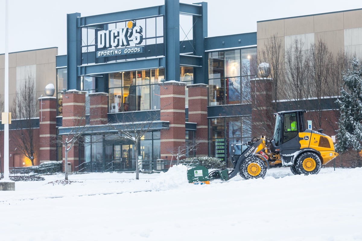 Commercial snow removal crew plowing snow 12