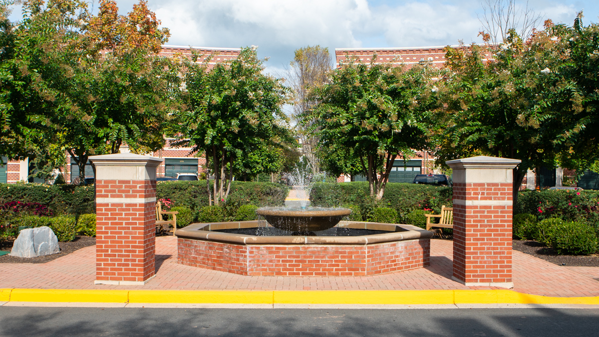 West Market Community Association fountain water feature sitting area landscaping